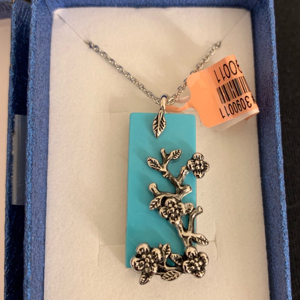 15 carats of Blue Howlite with 20” chain